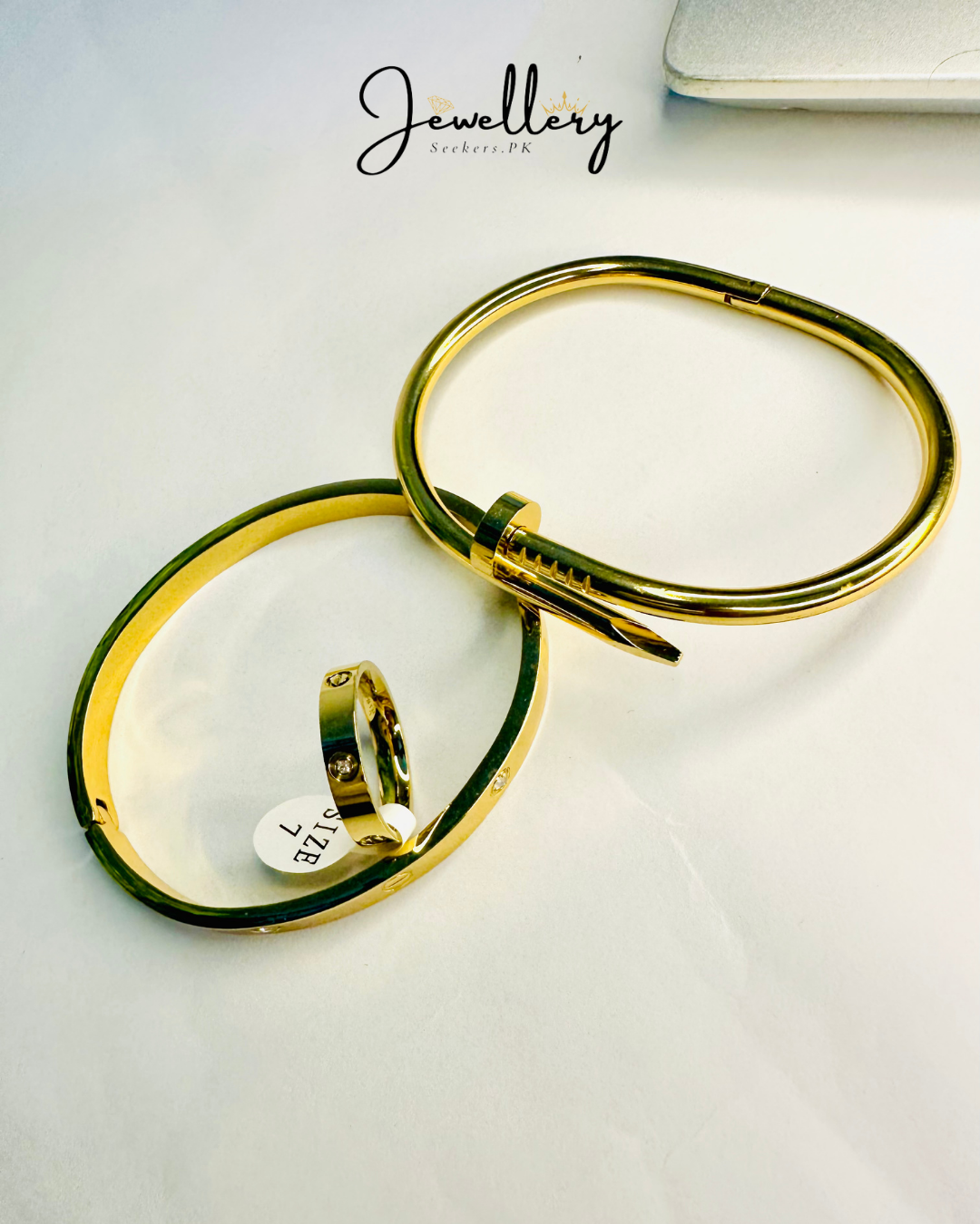 Nail, Cartier bangle with Ring